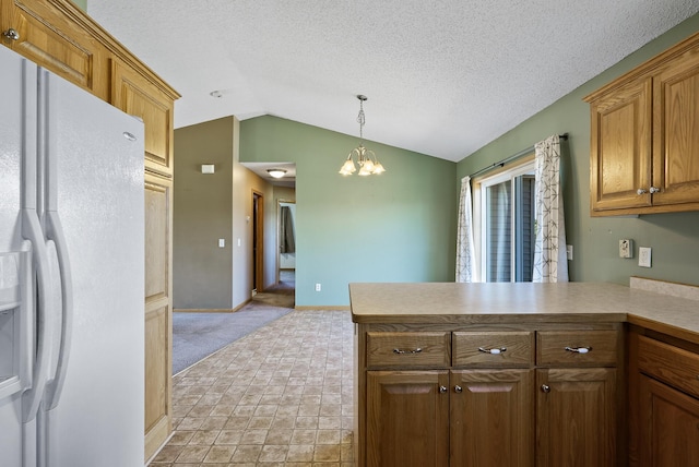 30354 118th St, Baldwin Twp, MN 55371 - kitchen with white refrigerator with ice dispenser, lofted ceiling, a peninsula, a chandelier, and pendant lighting