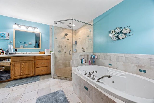 36773 Rose Lake Rd, Hobart Twp, MN 56544 - bathroom featuring a shower stall, a tub with jets, vanity, and tile patterned flooring