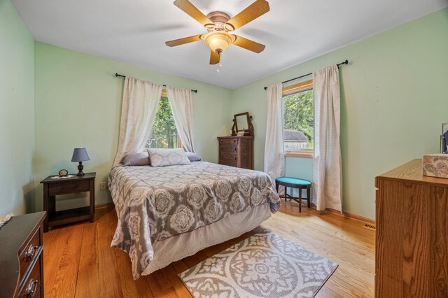 36773 Rose Lake Rd, Hobart Twp, MN 56544 - bedroom with light wood-style flooring and ceiling fan