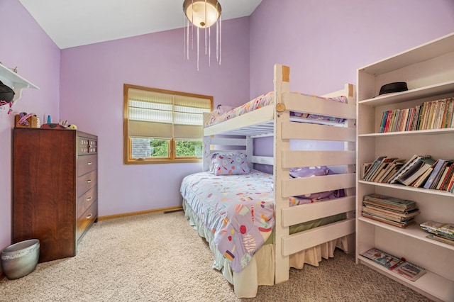 36773 Rose Lake Rd, Hobart Twp, MN 56544 - carpeted bedroom with vaulted ceiling and baseboards