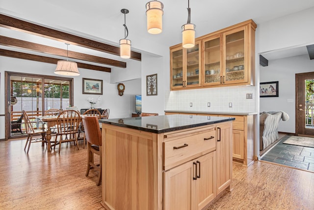 3599 210th St E, Vermillion Twp, MN 55024 - kitchen featuring light brown cabinetry, tasteful backsplash, beam ceiling, glass insert cabinets, and a kitchen island