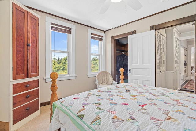 3599 210th St E, Vermillion Twp, MN 55024 - bedroom featuring ornamental molding, light colored carpet, and a ceiling fan