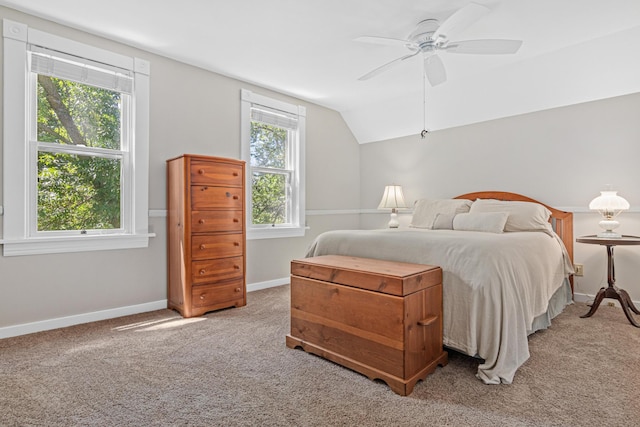 3599 210th St E, Vermillion Twp, MN 55024 - carpeted bedroom featuring multiple windows, vaulted ceiling, and a ceiling fan