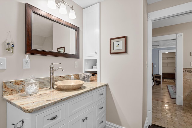 3599 210th St E, Vermillion Twp, MN 55024 - bathroom with vanity and baseboards