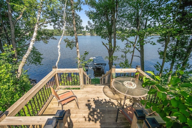 18465 Lake Ln, Chengwatana Twp, MN 55063 - deck featuring a water view and a dock