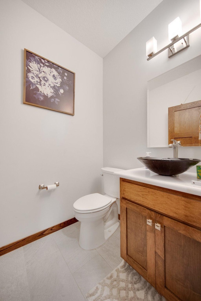 18465 Lake Ln, Chengwatana Twp, MN 55063 - bathroom with vanity, tile patterned floors, and a textured ceiling