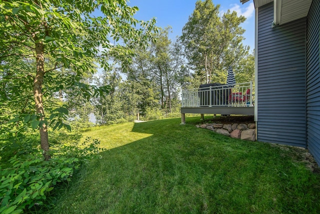 18465 Lake Ln, Chengwatana Twp, MN 55063 - view of grassy yard with a wooden deck