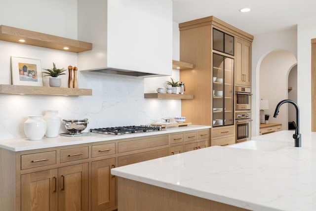 5250 Polaris Ln N, Plymouth, MN 55446 - kitchen with appliances with stainless steel finishes, open shelves, decorative backsplash, light stone countertops, and recessed lighting