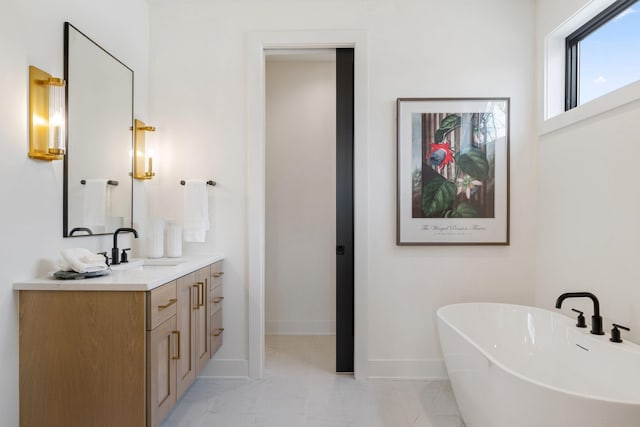 5250 Polaris Ln N, Plymouth, MN 55446 - full bathroom featuring a soaking tub, vanity, and marble finish flooring
