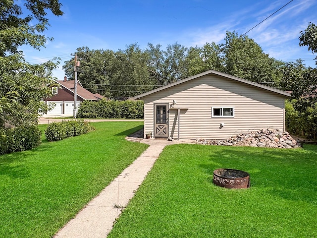 306 Jefferson St, Minneota, MN 56264 - view of outdoor structure with an outdoor fire pit