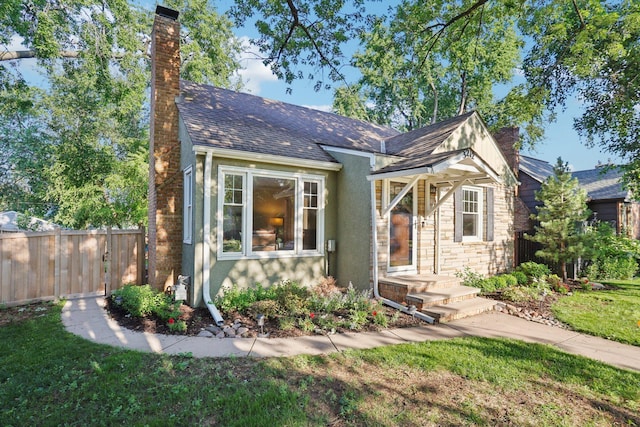 3212 Kentucky Ave S, Saint Louis Park, MN 55426 - view of front of home featuring a chimney and stucco siding