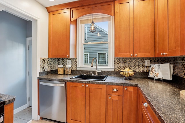 3212 Kentucky Ave S, Saint Louis Park, MN 55426 - kitchen with dishwasher, brown cabinetry, plenty of natural light, and tasteful backsplash
