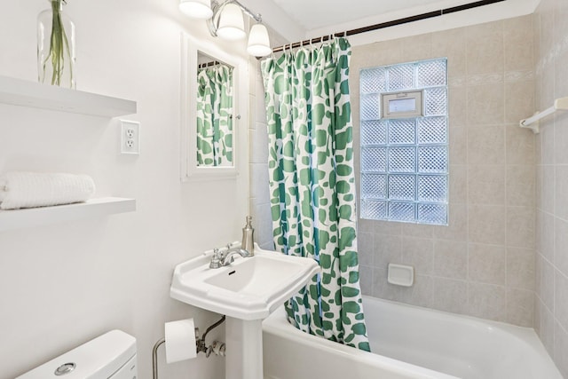 3212 Kentucky Ave S, Saint Louis Park, MN 55426 - bathroom featuring shower / bath combo with shower curtain and toilet