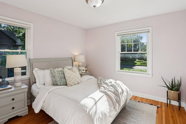 3212 Kentucky Ave S, Saint Louis Park, MN 55426 - bedroom with wood finished floors and baseboards