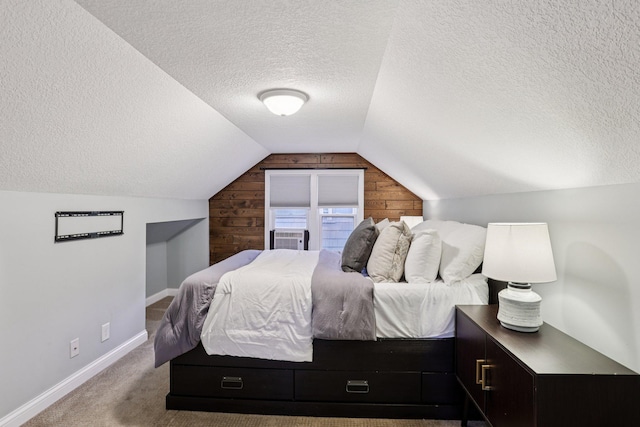 3212 Kentucky Ave S, Saint Louis Park, MN 55426 - bedroom featuring a textured ceiling, wood walls, carpet flooring, and vaulted ceiling