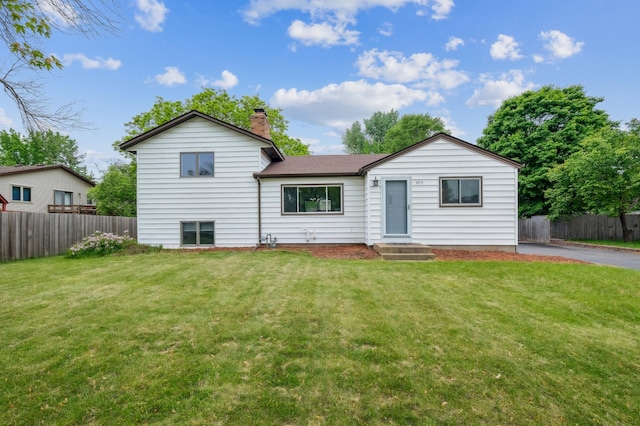 2715 90th Ln NE, Blaine, MN 55449 - view of front of home featuring a chimney