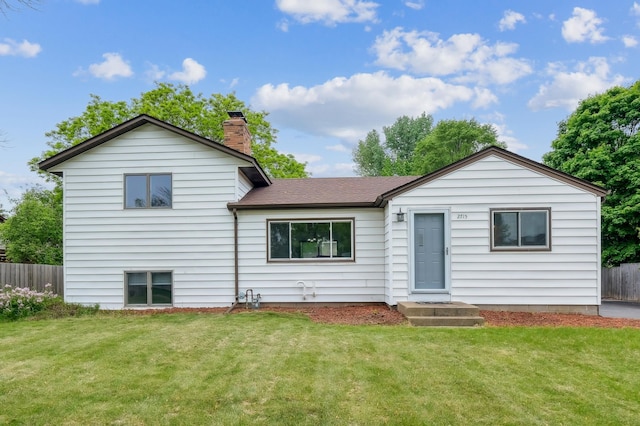 2715 90th Ln NE, Blaine, MN 55449 - view of front of property featuring a chimney and roof with shingles