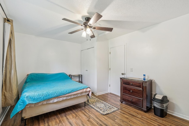 2715 90th Ln NE, Blaine, MN 55449 - bedroom with wood finished floors and a ceiling fan