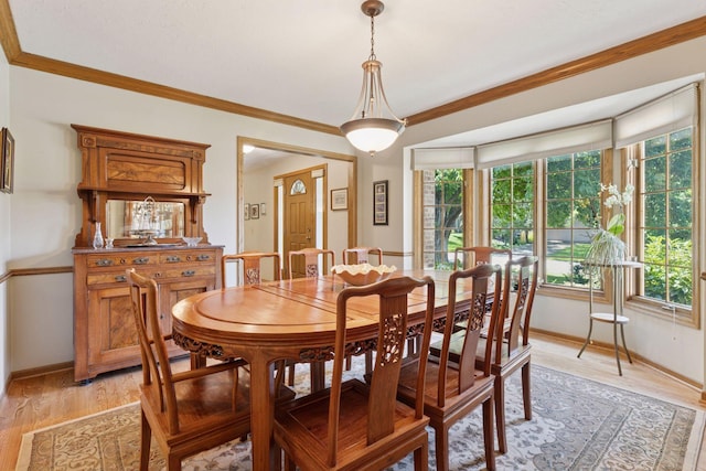 10910 38th Ave N, Plymouth, MN 55441 - dining room with plenty of natural light, ornamental molding, and light wood-style flooring