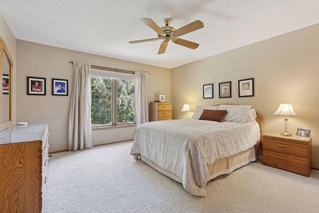 10910 38th Ave N, Plymouth, MN 55441 - bedroom featuring light colored carpet, a textured ceiling, and a ceiling fan