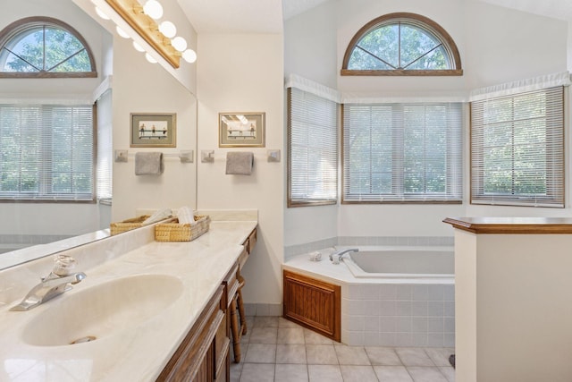 10910 38th Ave N, Plymouth, MN 55441 - bathroom with tile patterned floors, healthy amount of natural light, vanity, and a bath