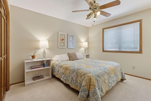 10910 38th Ave N, Plymouth, MN 55441 - carpeted bedroom featuring a textured ceiling and ceiling fan