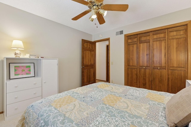 10910 38th Ave N, Plymouth, MN 55441 - carpeted bedroom with a closet and a ceiling fan