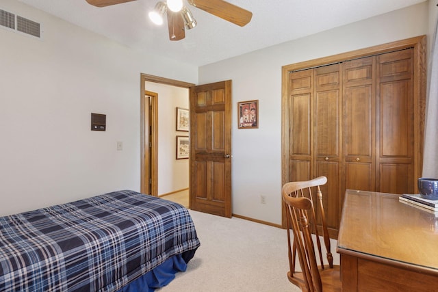 10910 38th Ave N, Plymouth, MN 55441 - bedroom featuring light colored carpet, ceiling fan, and a closet