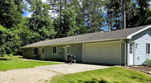 17544 366th St, Bagley, MN 56621 - ranch-style house featuring a garage, a front yard, and concrete driveway