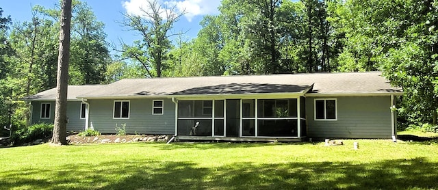 17544 366th St, Bagley, MN 56621 - rear view of property with a yard and a sunroom