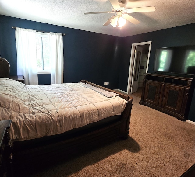 17544 366th St, Bagley, MN 56621 - bedroom with a textured ceiling, light colored carpet, and a ceiling fan