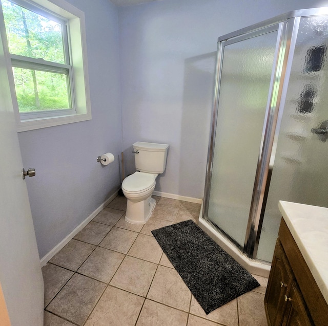 17544 366th St, Bagley, MN 56621 - bathroom with vanity, tile patterned floors, and a stall shower