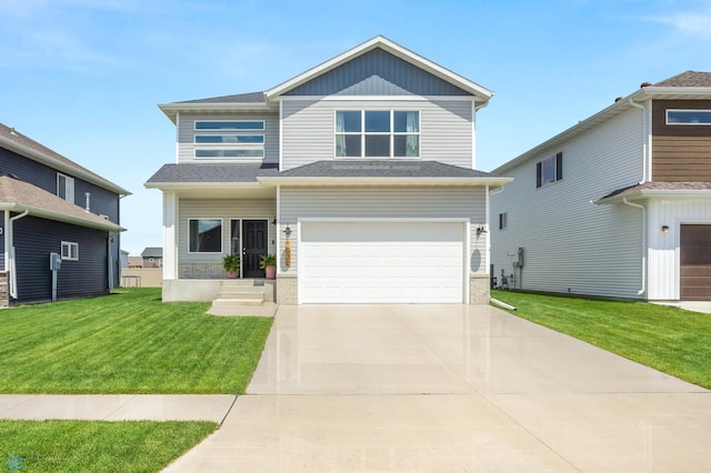 1030 Albert Dr W, West Fargo, ND 58078 - view of front of property featuring an attached garage, a front yard, and concrete driveway
