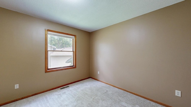 4019 Baffin Ln NE, Rochester, MN 55906 - empty room featuring carpet flooring and baseboards