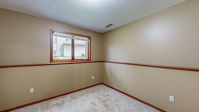 4019 Baffin Ln NE, Rochester, MN 55906 - empty room with a textured ceiling and carpet