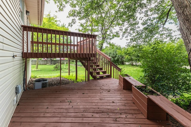 4019 Baffin Ln NE, Rochester, MN 55906 - wooden deck featuring stairs and a yard