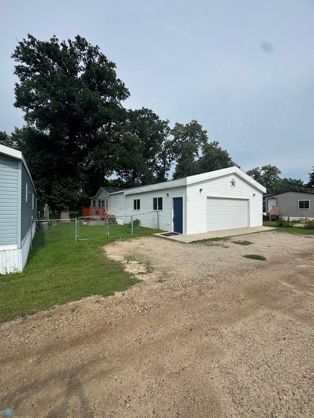 11 Horseshoe Bnd, Horace, ND 58047 - view of front of house with an outdoor structure and dirt driveway