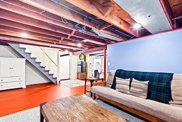 4332 Cooke St, Duluth, MN 55804 - living area featuring stairway and finished concrete floors
