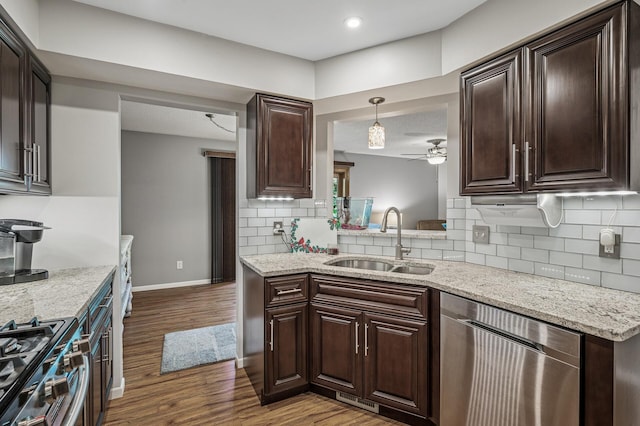 8 110th Ln NW, Coon Rapids, MN 55448 - kitchen with stainless steel appliances, wood finished floors, ceiling fan, dark brown cabinets, and recessed lighting