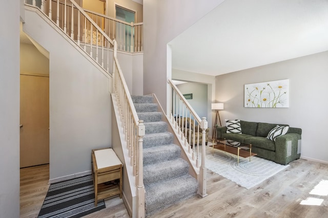 2722 Autumn Woods Dr, Chaska, MN 55318 - staircase featuring wood finished floors and baseboards