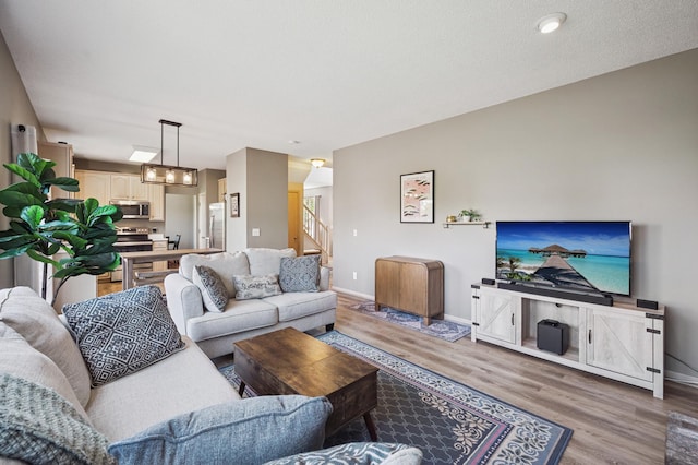 2722 Autumn Woods Dr, Chaska, MN 55318 - living room with light wood finished floors and baseboards