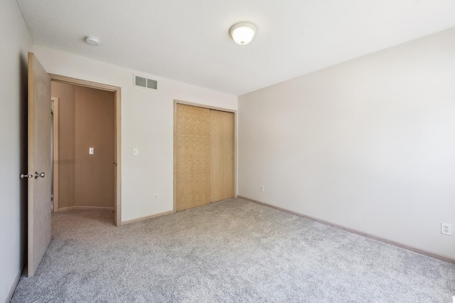 2722 Autumn Woods Dr, Chaska, MN 55318 - unfurnished bedroom with carpet flooring and a closet