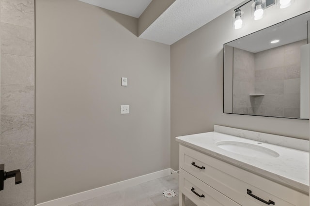 13430 Vickers St NE, Andover, MN 55304 - full bath featuring vanity and baseboards