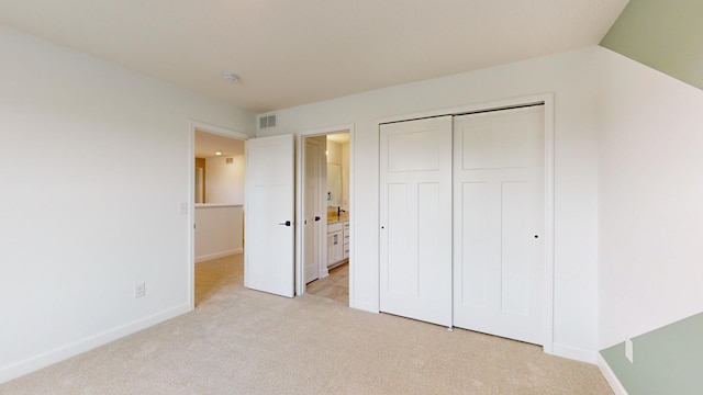 10565 Kingsview Ln N, Maple Grove, MN 55369 - unfurnished bedroom with light carpet and a closet
