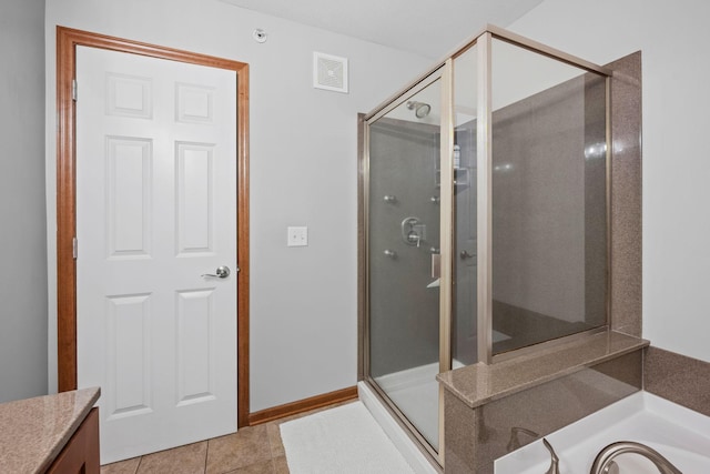 1964 Lincoln Ln, Chanhassen, MN 55317 - full bathroom with a stall shower, a garden tub, vanity, and tile patterned floors