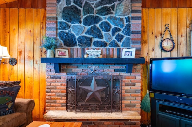 90162 Shady Oak Ln, Kerrick Twp, MN 55756 - detailed view of wood walls and a fireplace with raised hearth