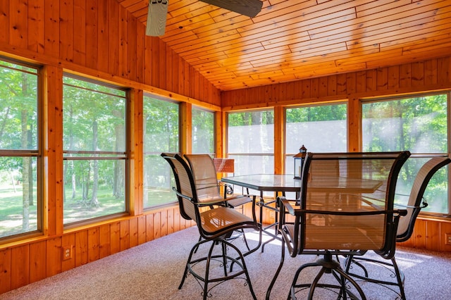 90162 Shady Oak Ln, Kerrick Twp, MN 55756 - carpeted dining room with plenty of natural light, wooden walls, vaulted ceiling, and wooden ceiling
