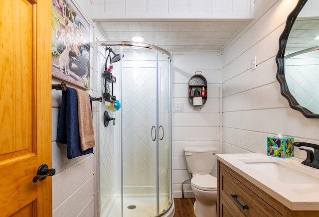 90162 Shady Oak Ln, Kerrick Twp, MN 55756 - bathroom featuring vanity, a stall shower, and wood finished floors