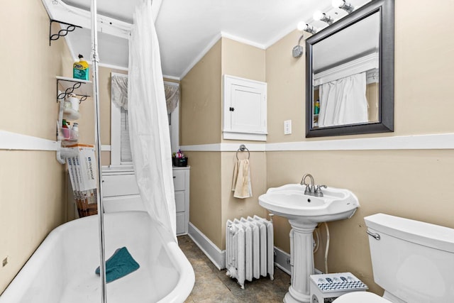 41 9th St, Cloquet, MN 55720 - full bathroom featuring radiator, a bathtub, and ornamental molding