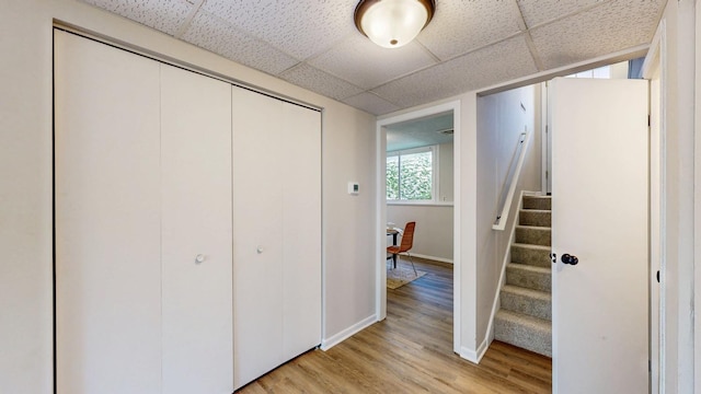 929 40th St NW, Rochester, MN 55901 - interior space with light wood-style floors, a paneled ceiling, and a closet